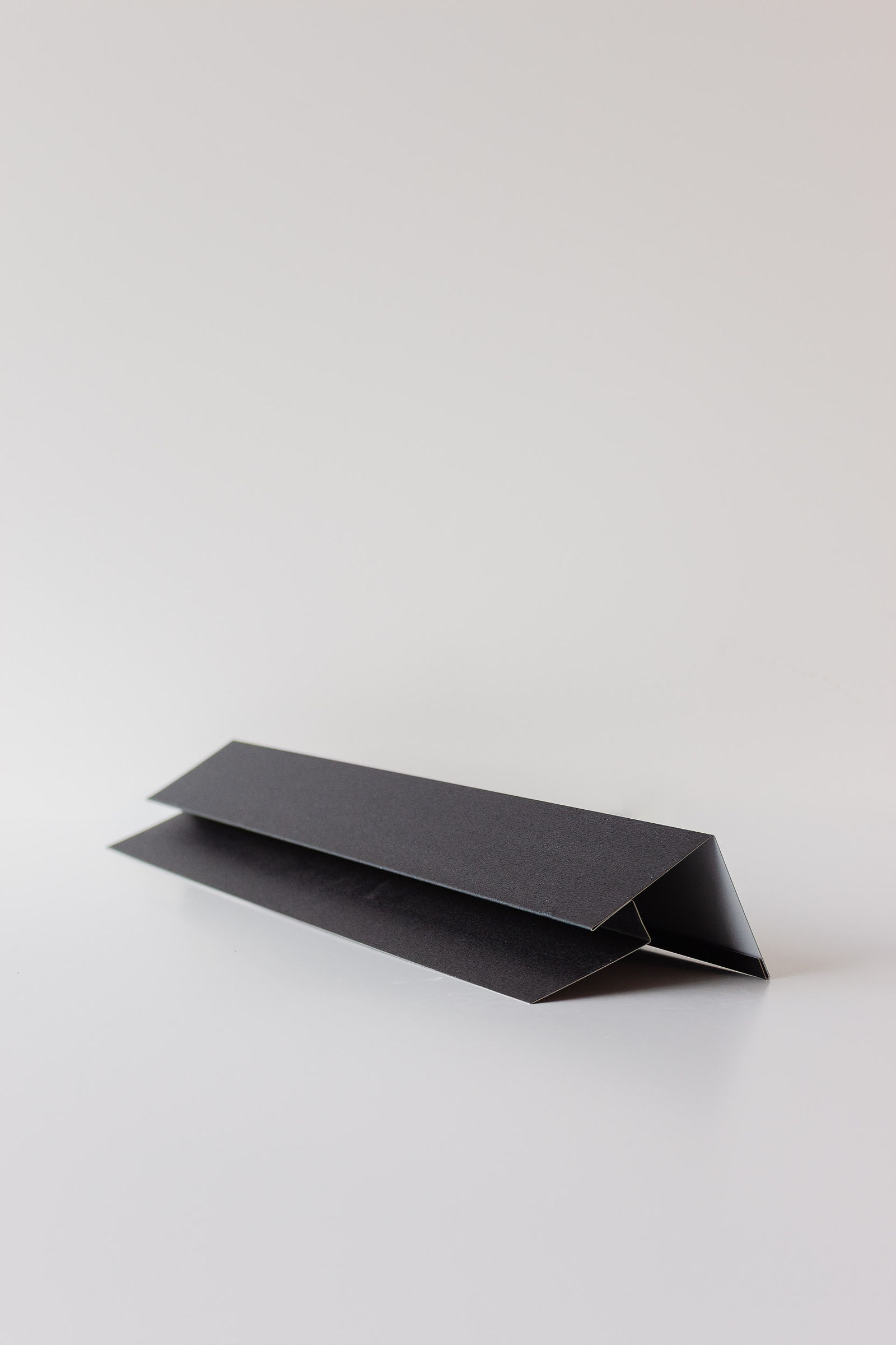 Over / Under steel trim profile