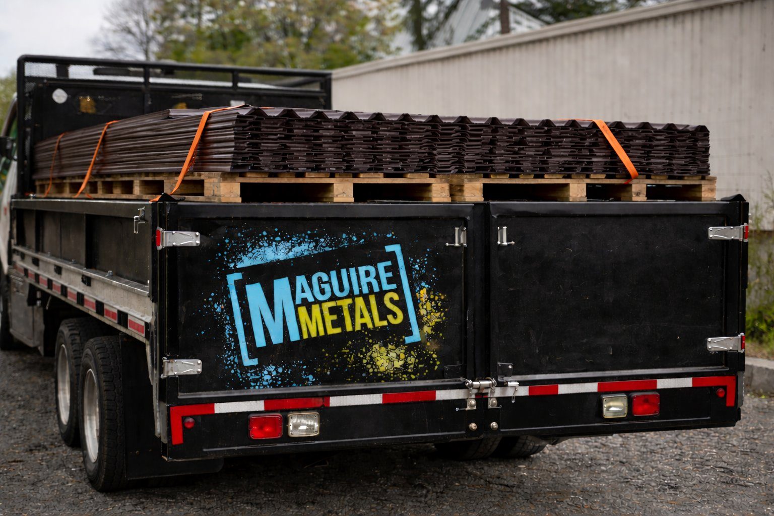 Maguire Metals delivery flatbed loaded with steel